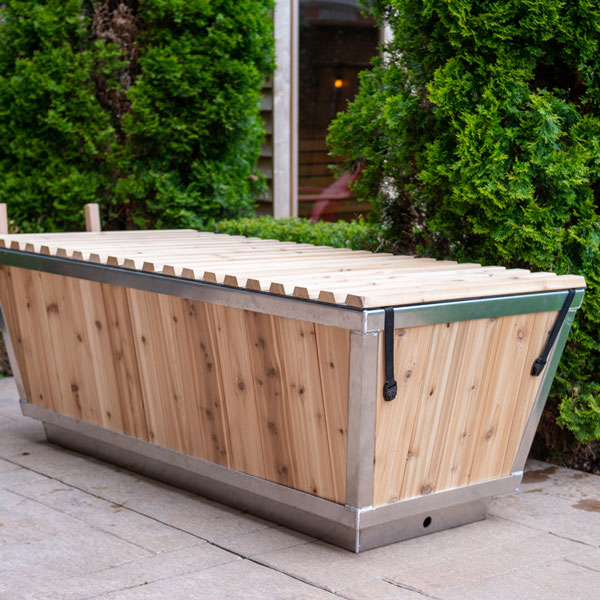 Dundalk Polar Plunge Tub cedar exterior with stainless banding on a backyard patio