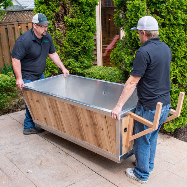 The Polar Plunge Tub is light enough for two people to carry, stainless steel interior visible